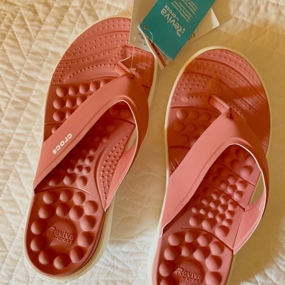Croc flip flops.